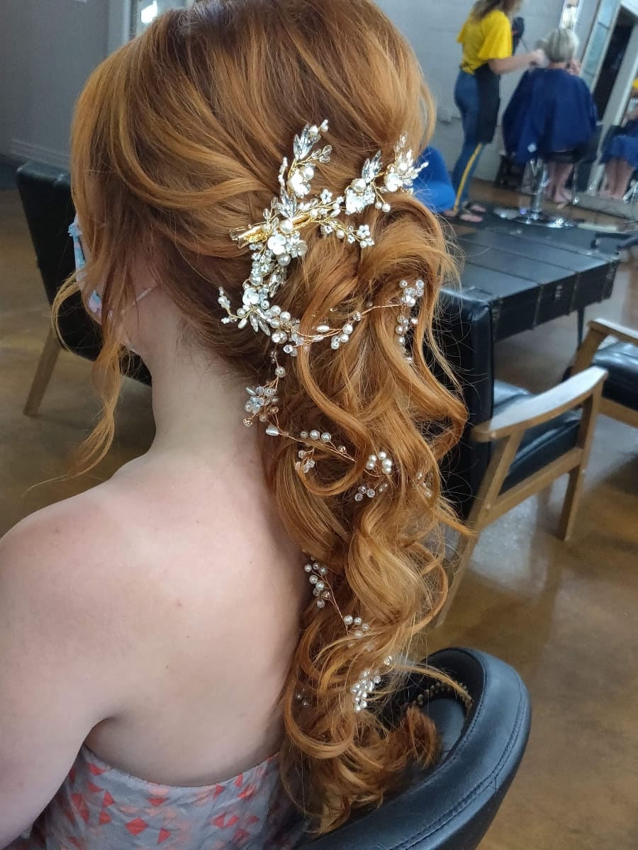 Bridal updo with a hair vine