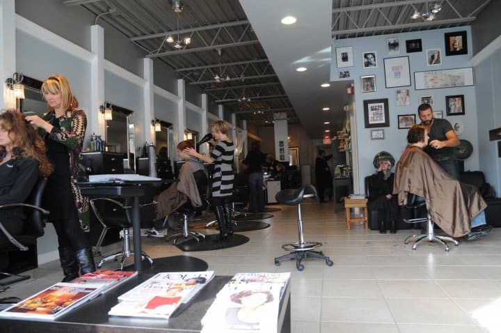 Stylists at work inside a Beauty Collective salon